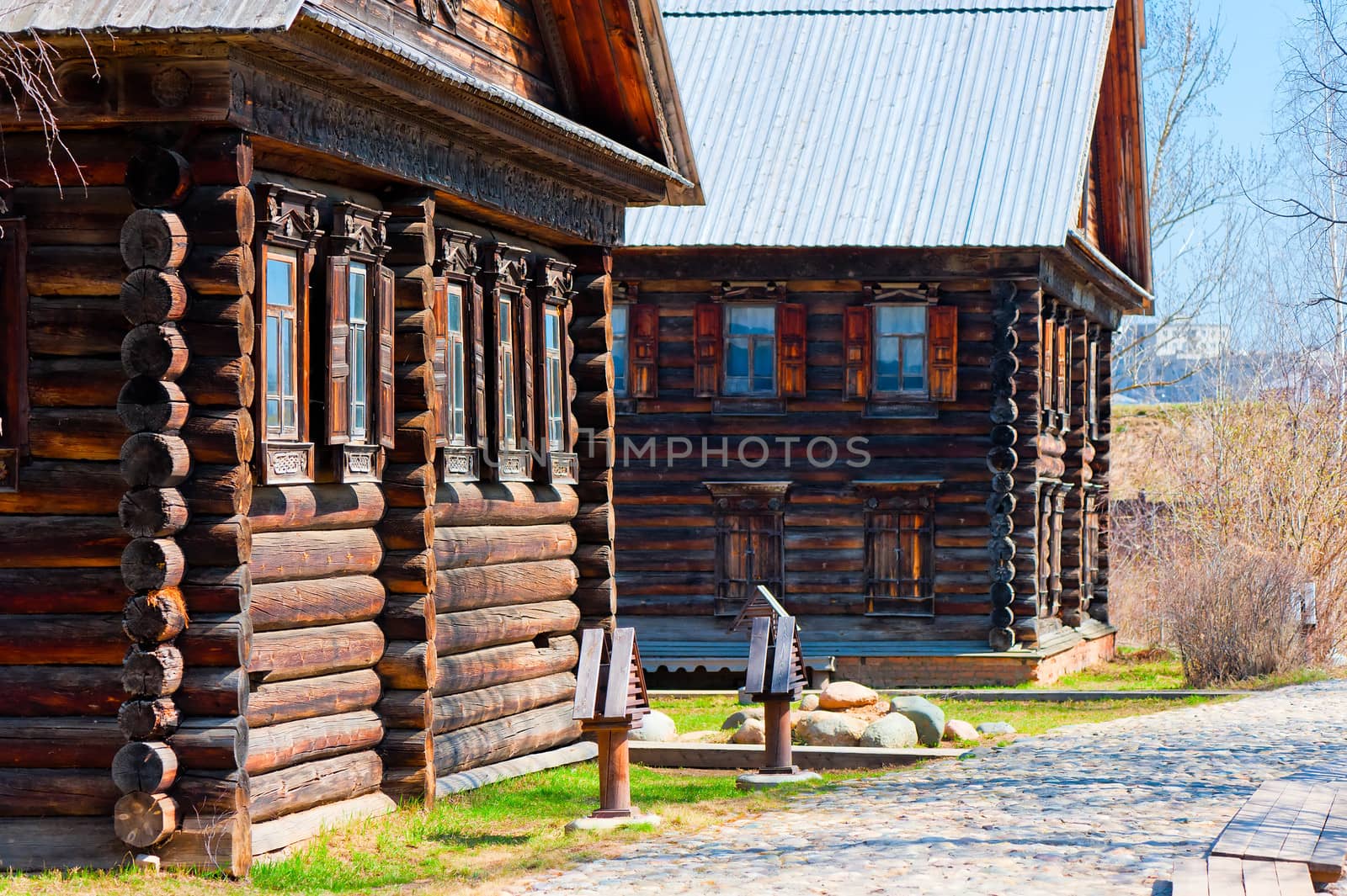 Facades Russian village of wooden houses in the old style