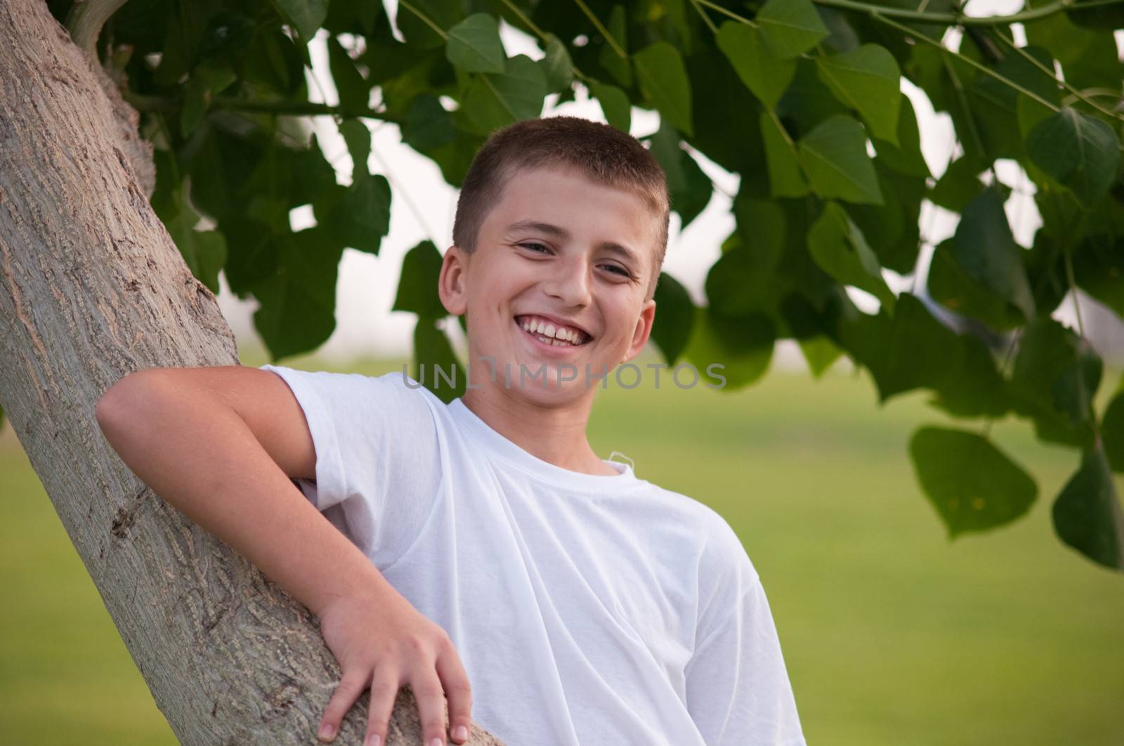 Portrait of a Boy at the  Park . by LarisaP