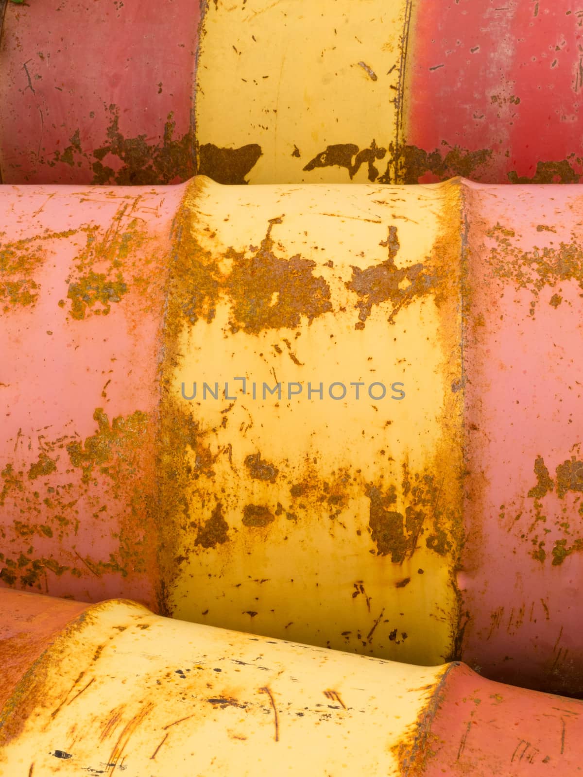 Rusty oil barrels yellow red background pattern by PiLens
