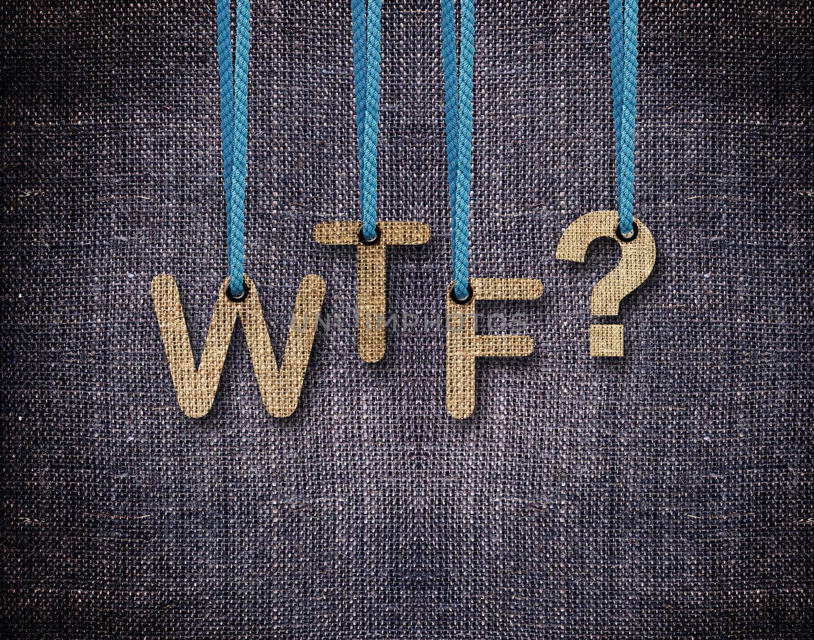 WTF Letters hanging strings with blue sackcloth background.