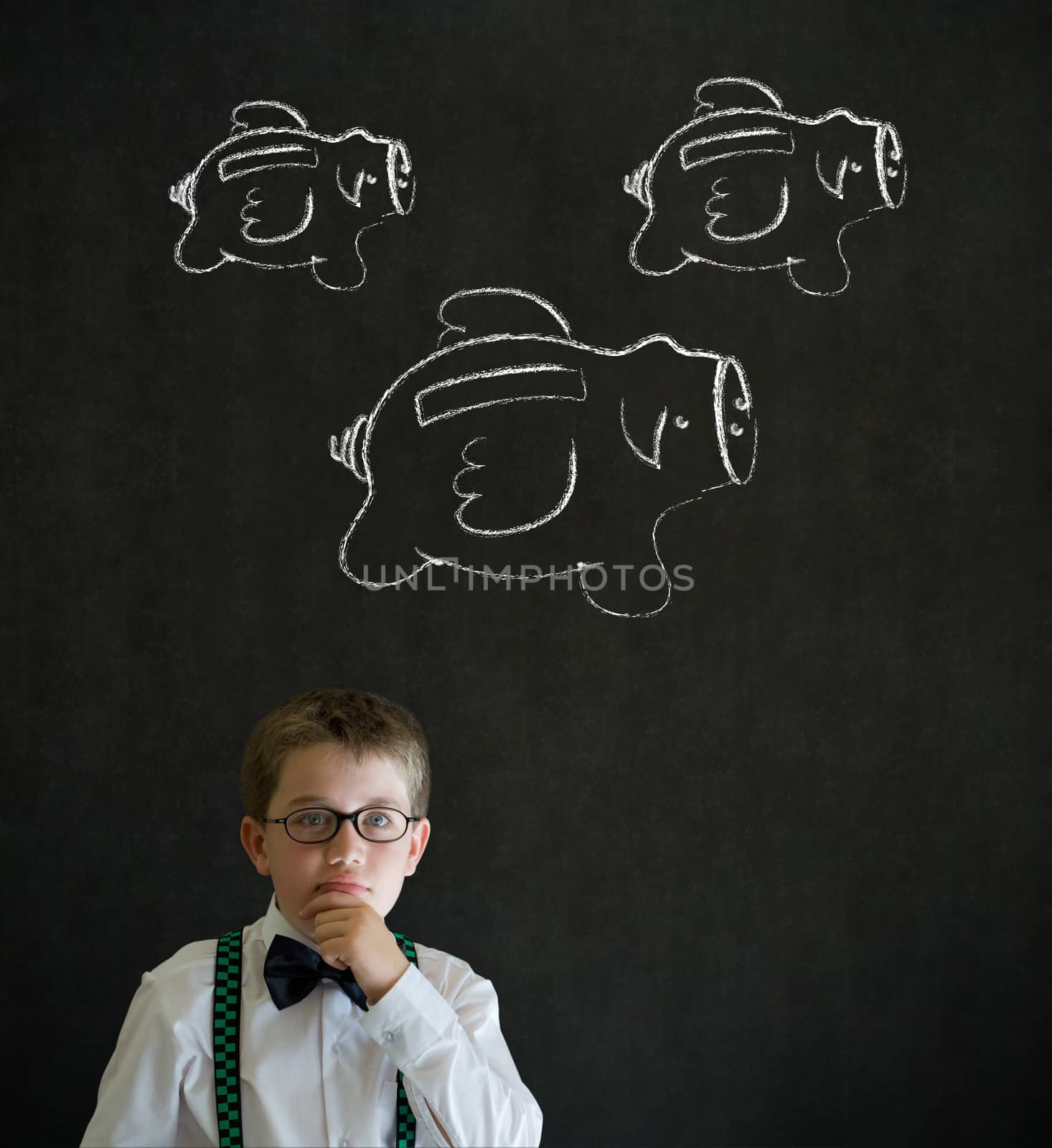 Young business boy thinking with flying money piggy banks in chalk on blackboard background by alistaircotton