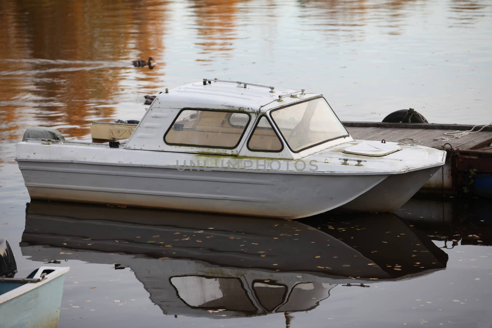 old motor boat at the pier side view