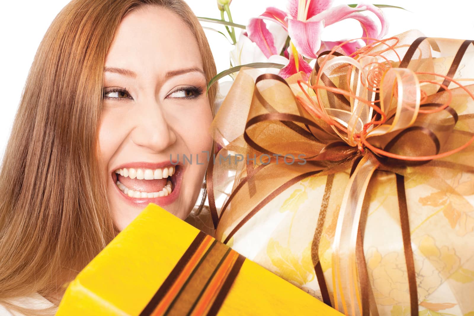 smiling woman, holding gift boxes on white background