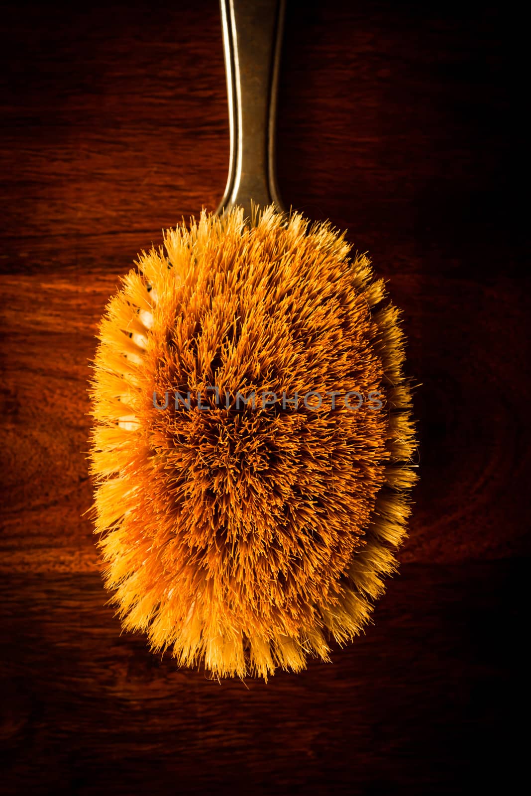 Hairbrush on wood by Sportactive
