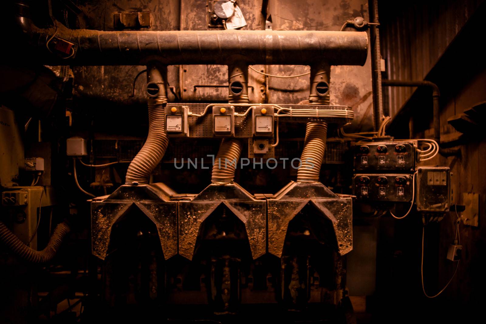 Grunge machinery in industrial surroundings