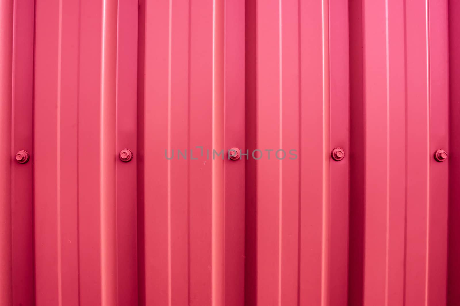 Colorful plastic wall with iron nuts