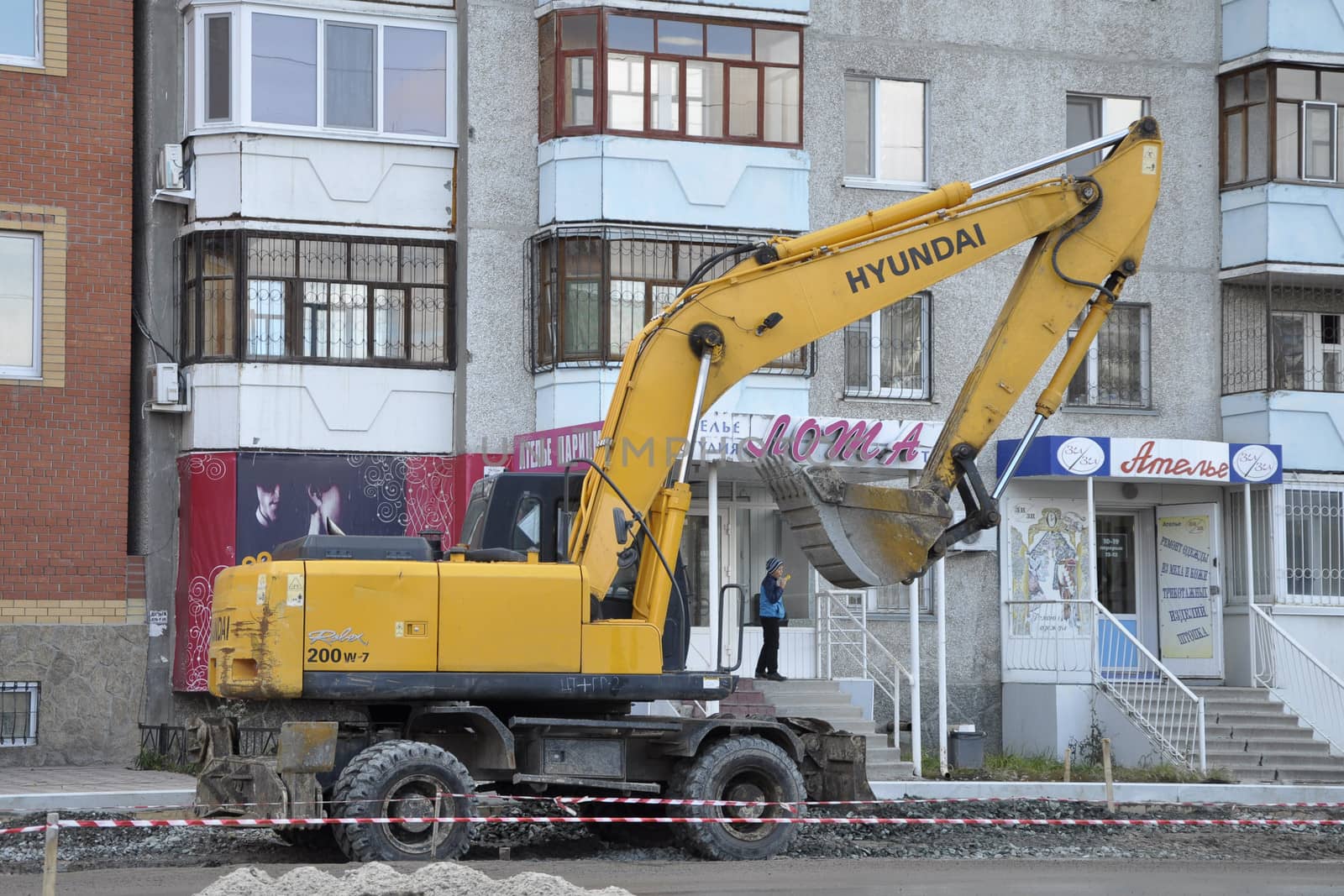 The special equipment on a construction of roads. Excavator.