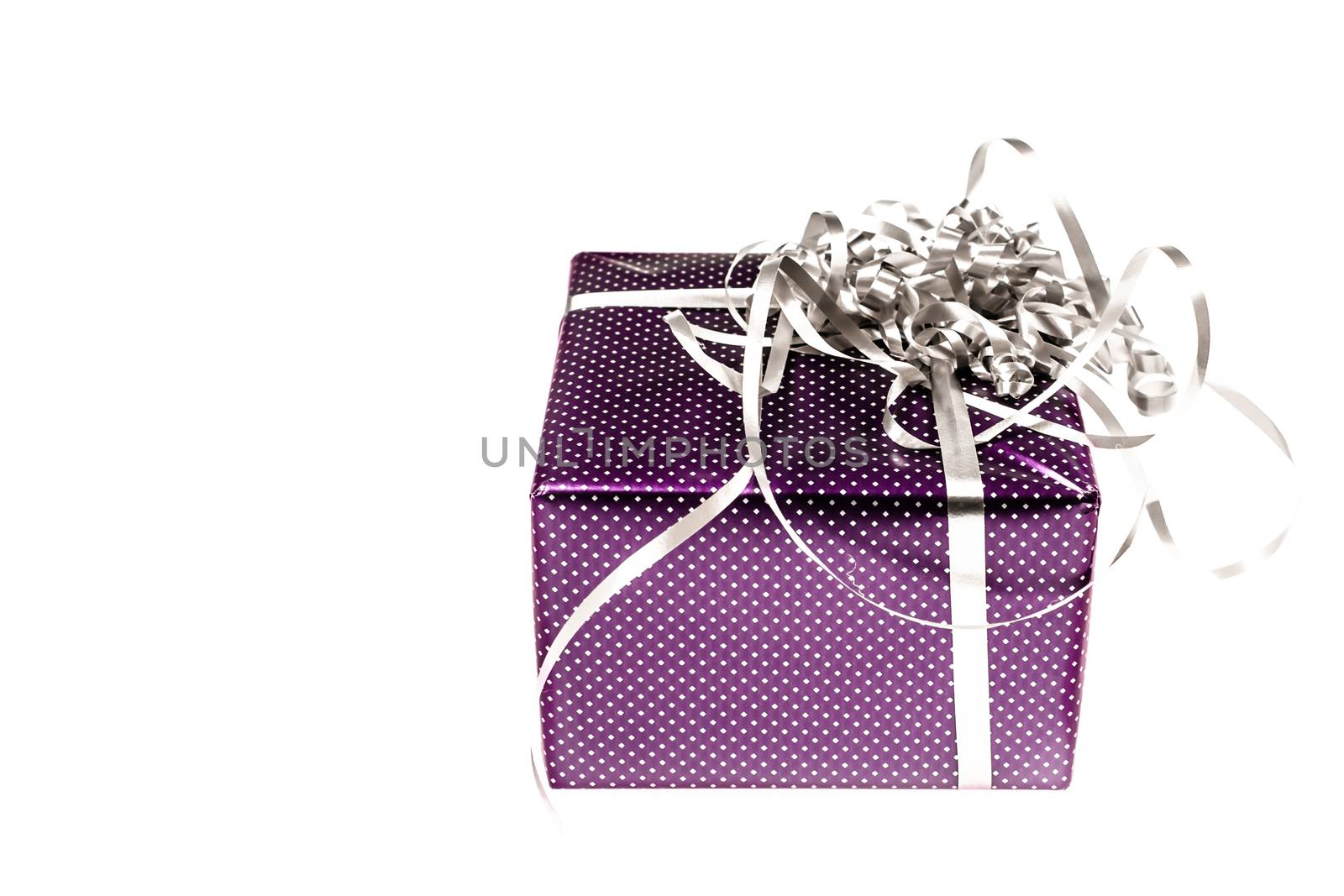 Colorful gift box with silver ribbon 