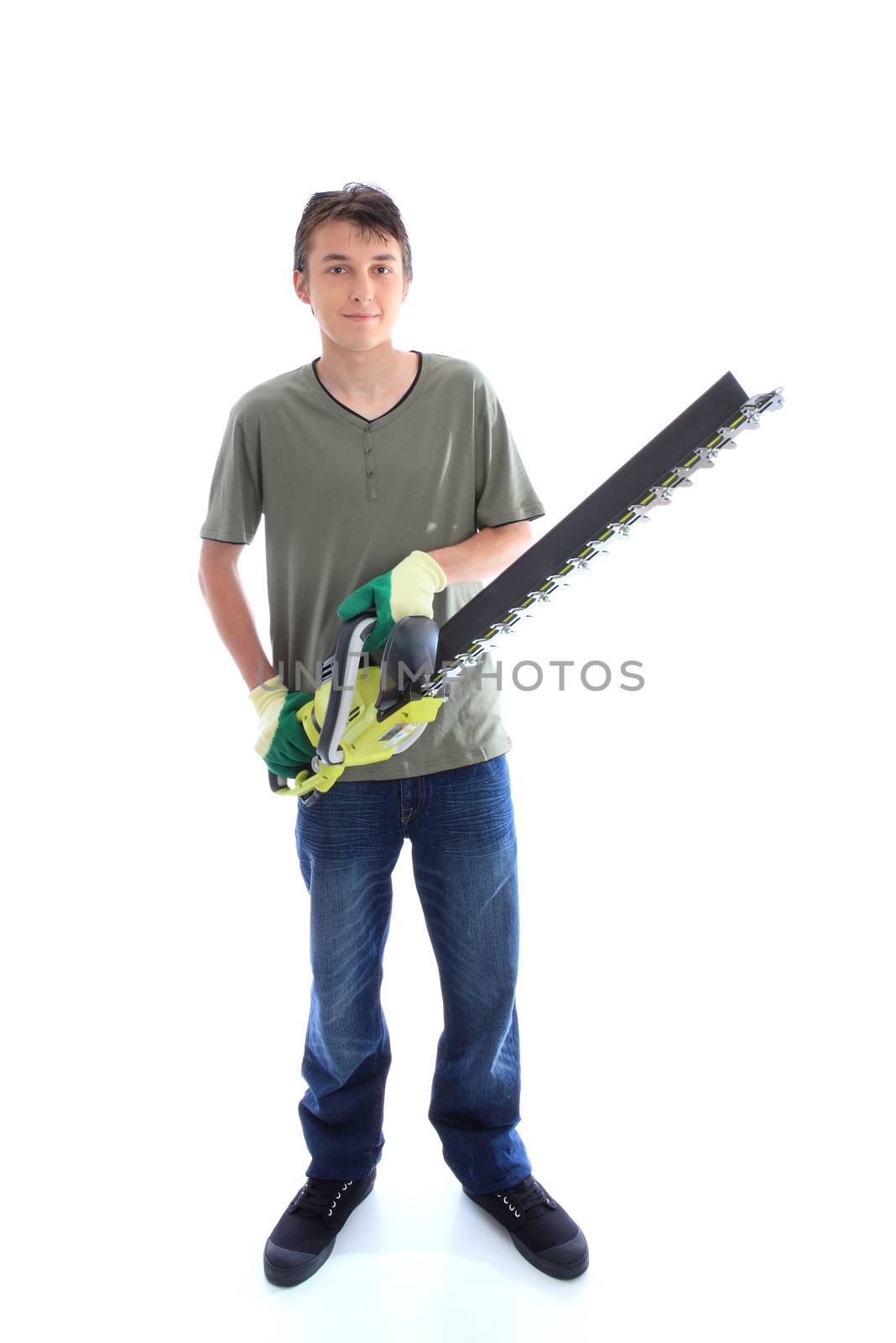 Male holding a hedge trimmer garden tool