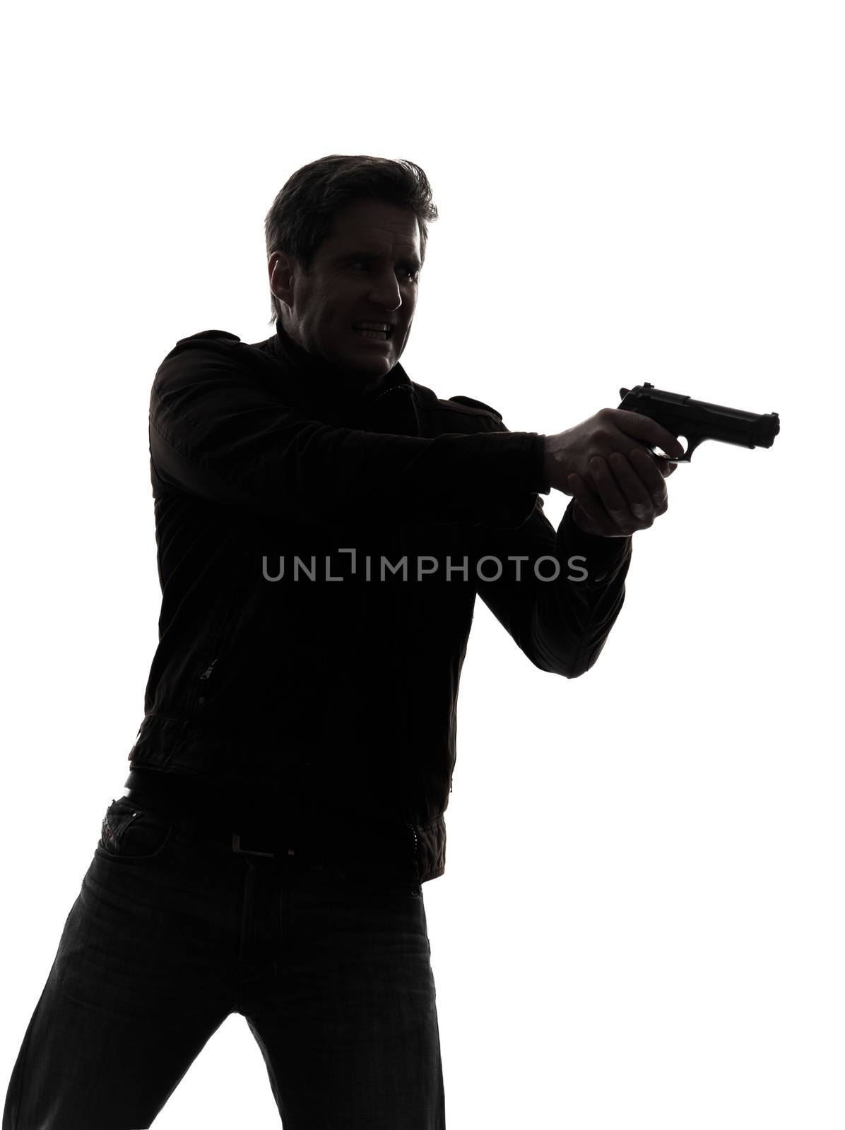one man killer policeman aiming gun portrait silhouette studio white background