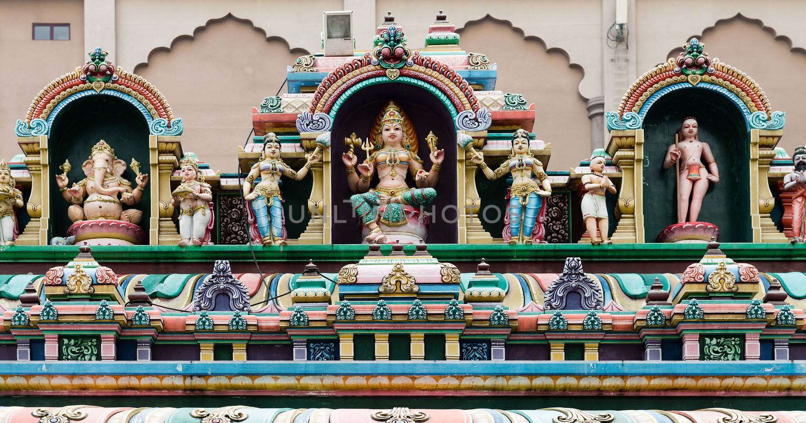 Traditonal Gods sculpture on Indian temple facade in Kuala Lumpur, Malaysia.  Sri Mahamariamman Temple. 