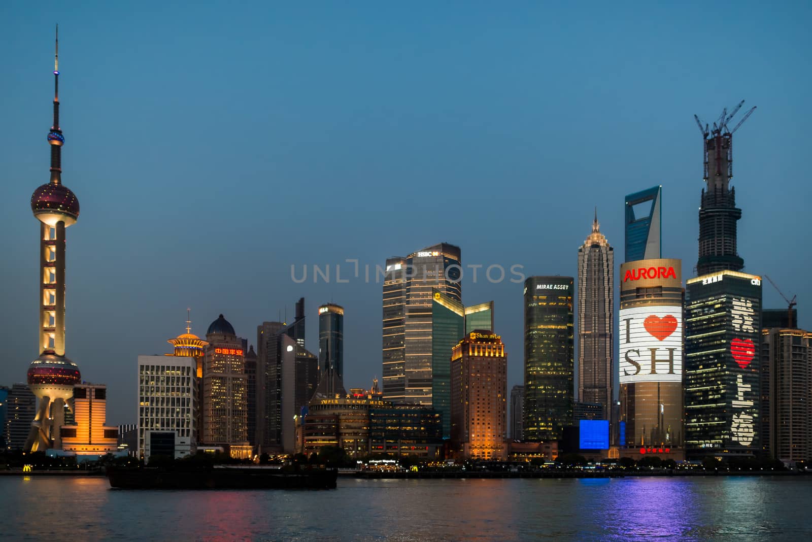 Shanghai, China - April 7, 2013: pudong waterfront at sunset  at the city of Shanghai in China on april 7th, 2013