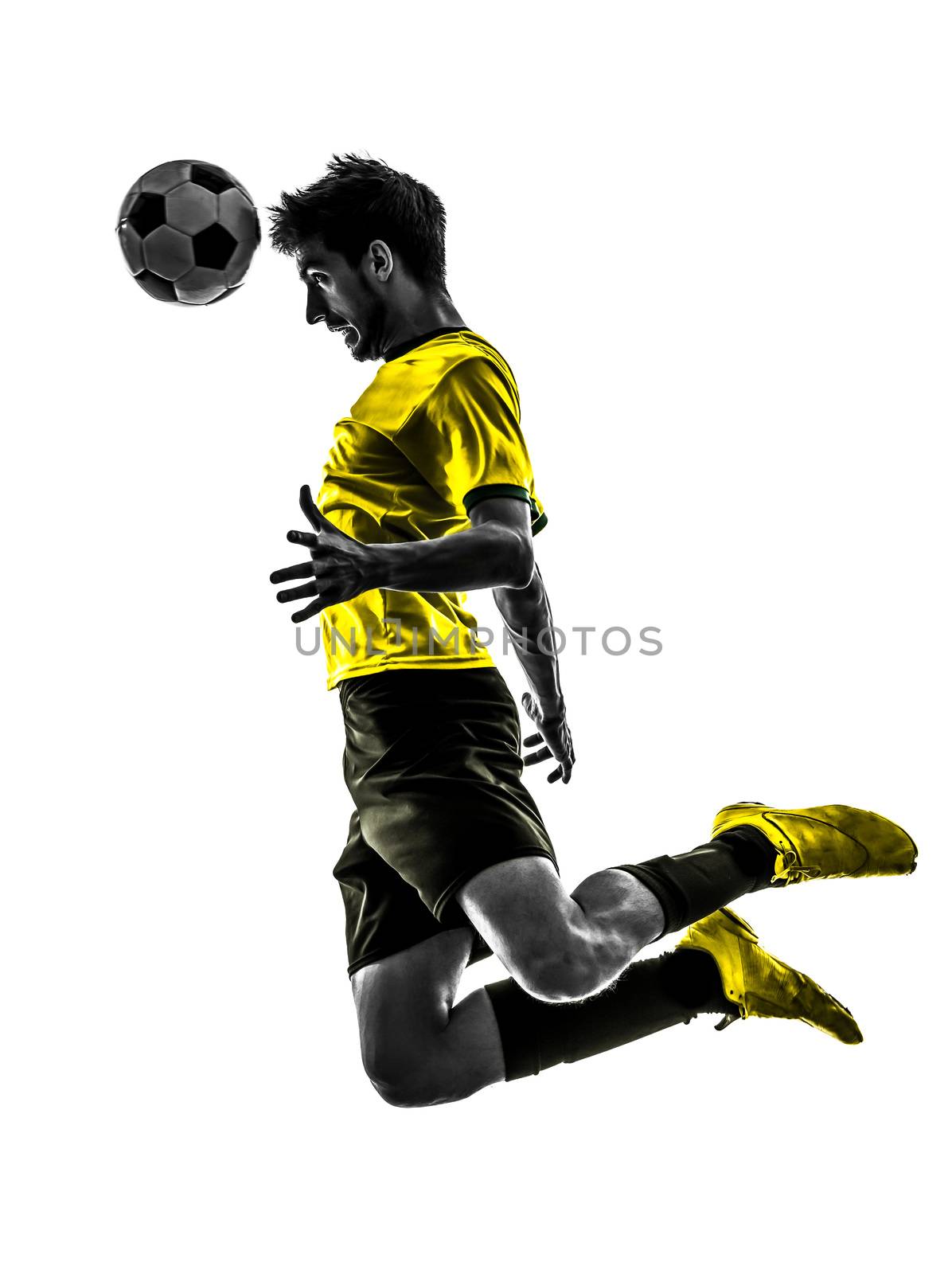 one brazilian soccer football player young man heading in silhouette studio  on white background