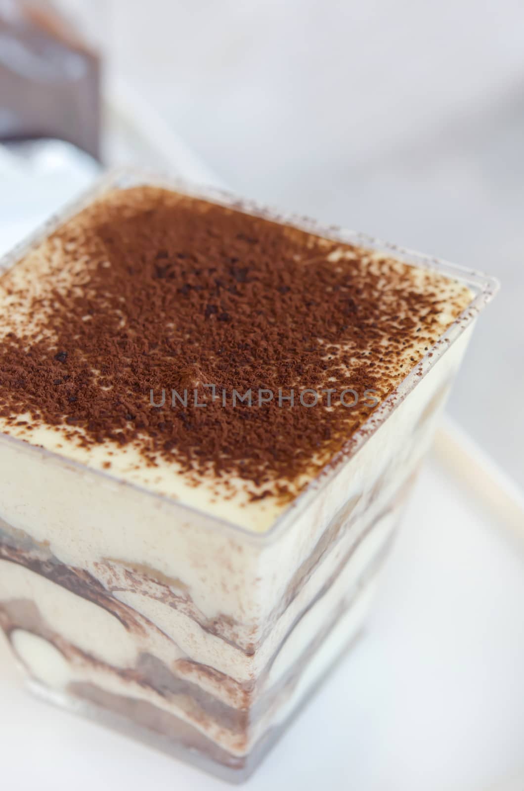 close up of Tiramisu cake in  a  glass  , sweet dessert  