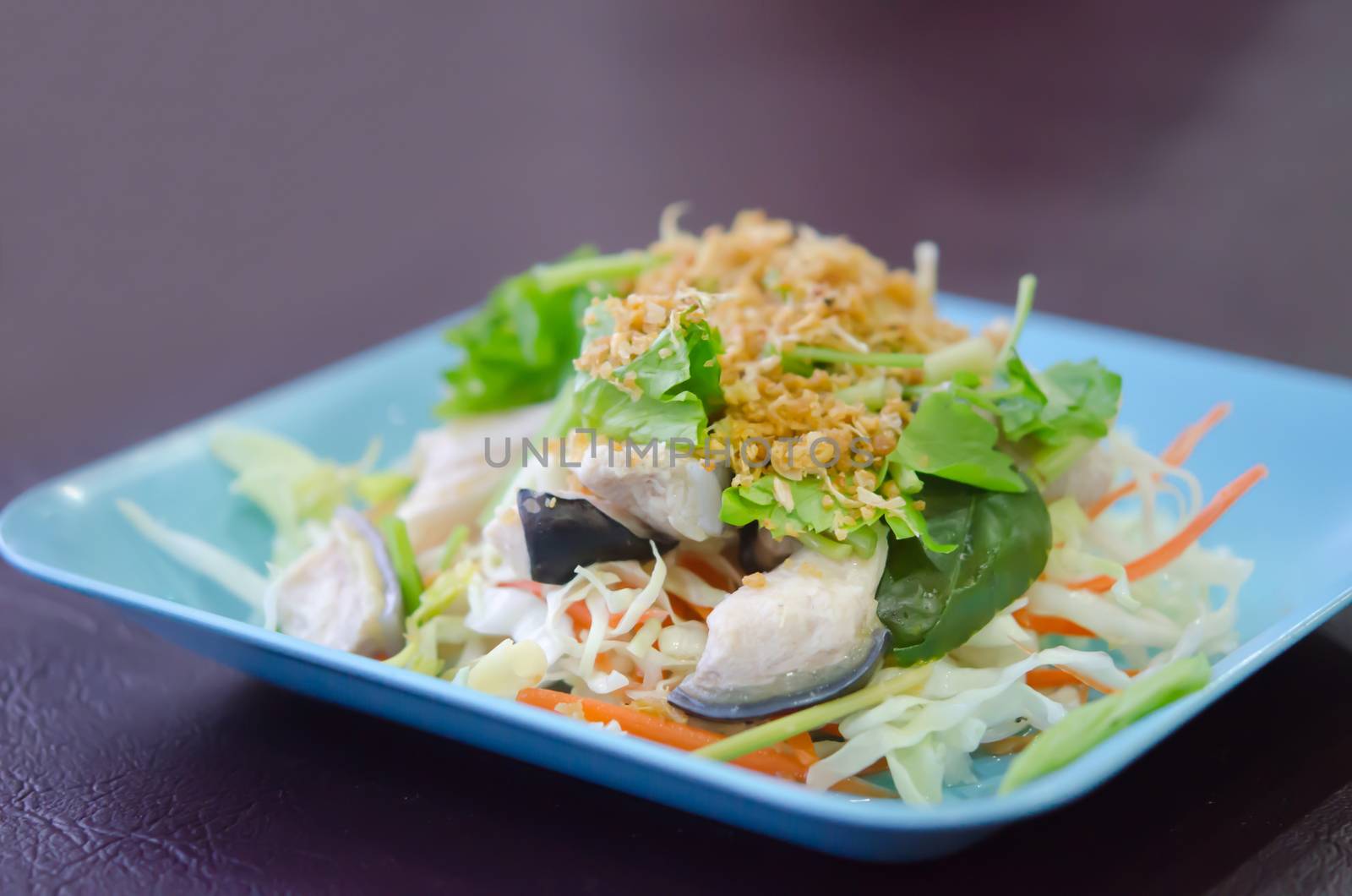 steamed fish with fried garlic and fresh vegetable