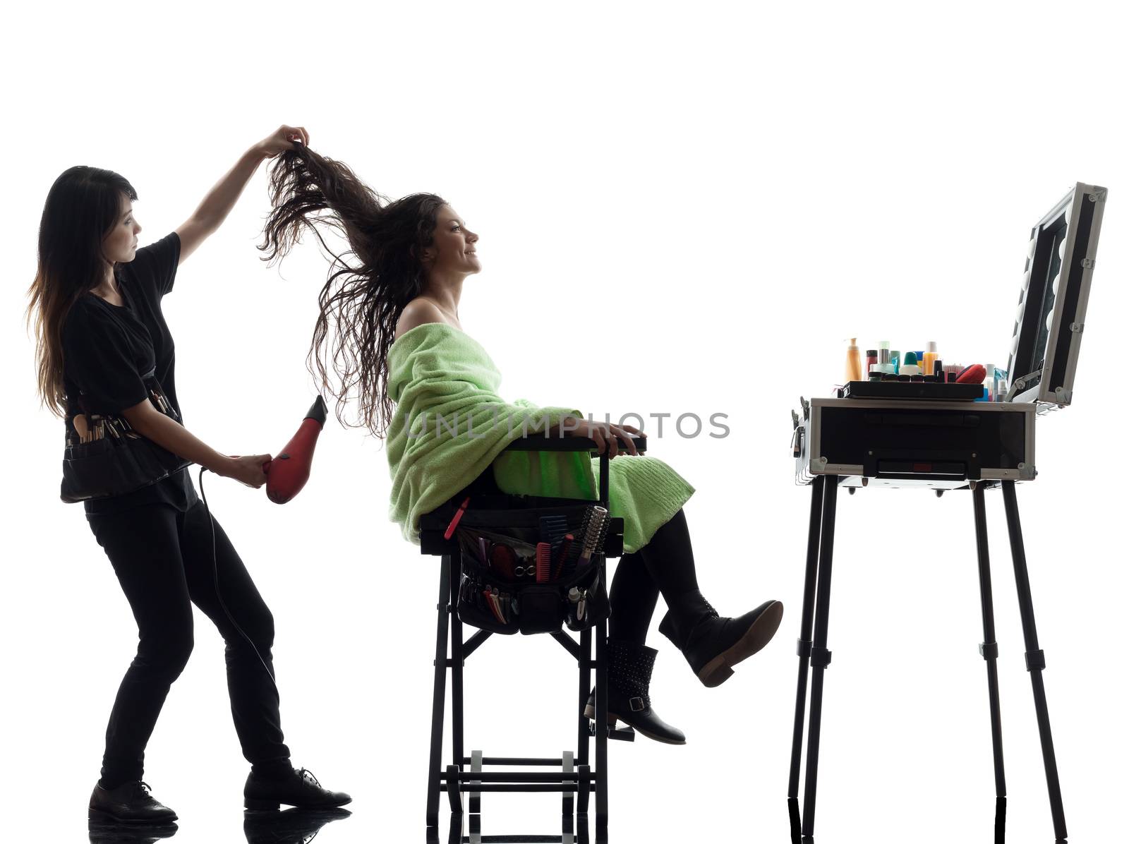 woman and hairdresser  in silhouette  on white background