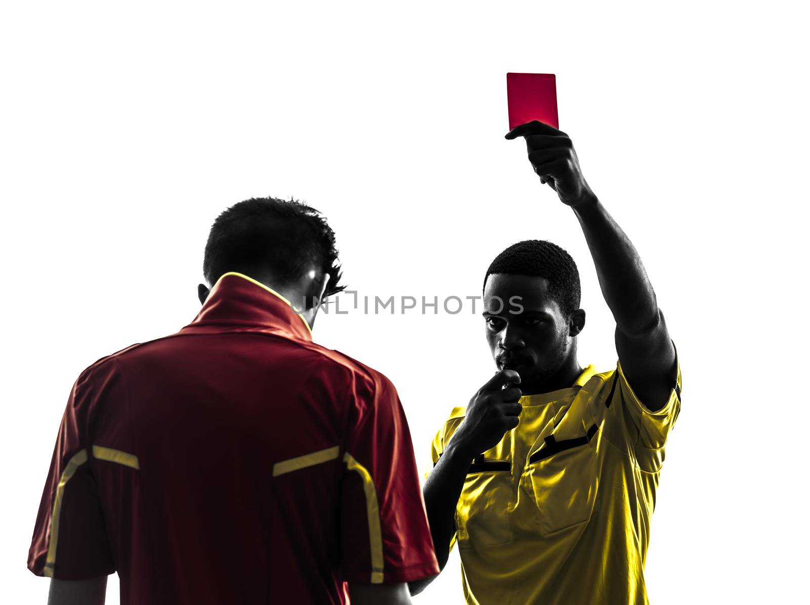 two men soccer player and referee showing red card in silhouette  on white background