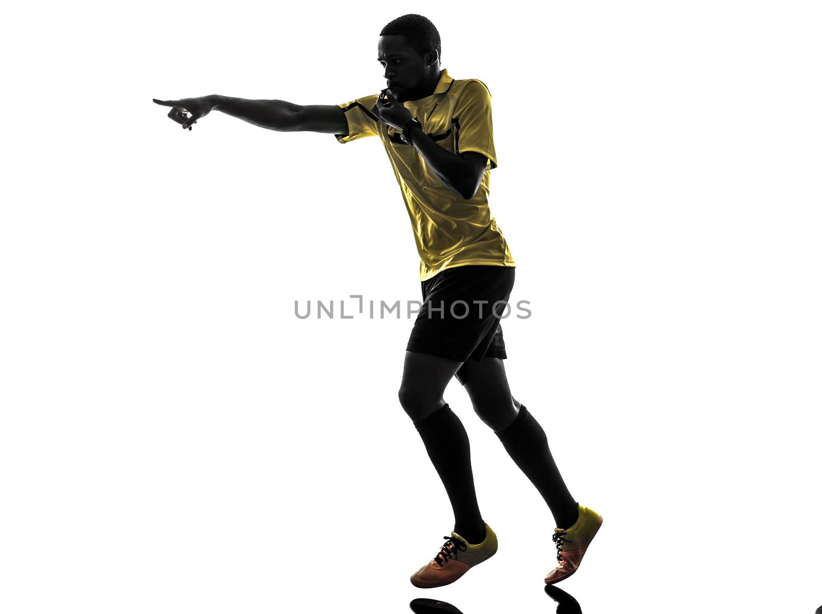 one african man referee  running whistling in silhouette  on white background