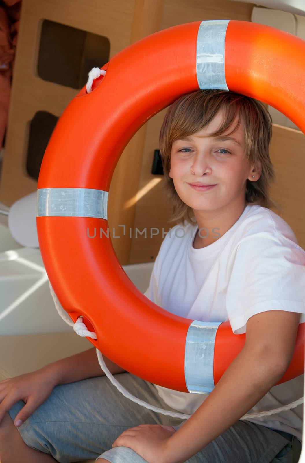 Young boy on board sea yacht . by LarisaP