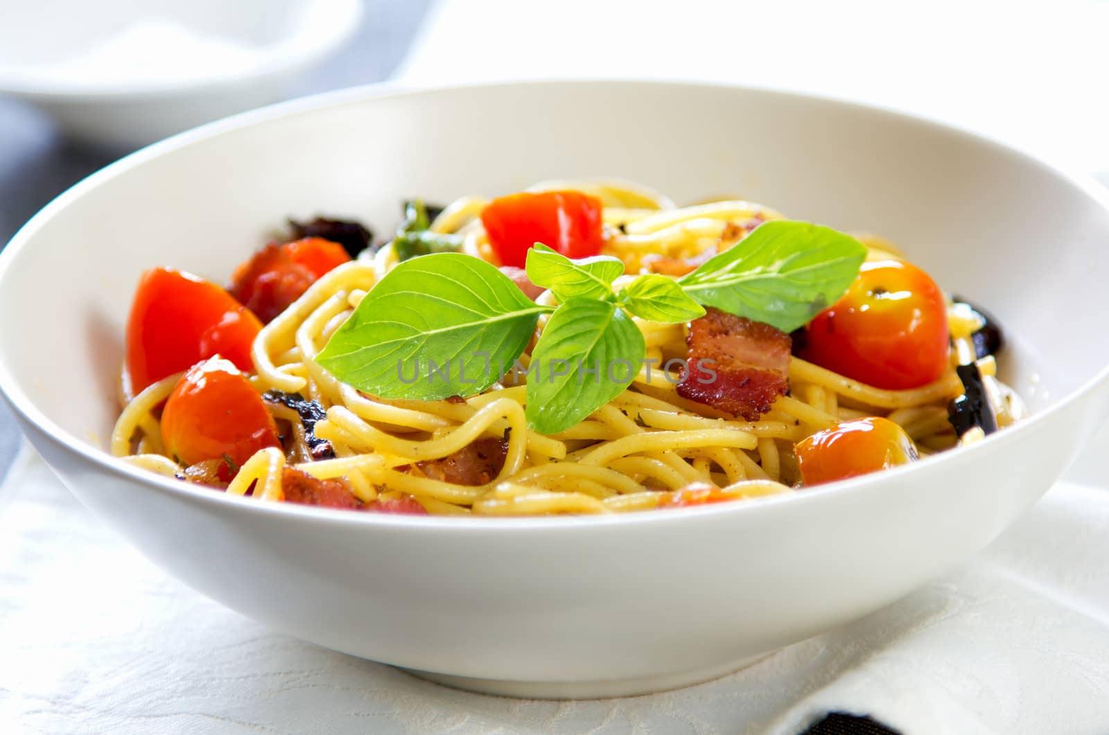 Spaghetti with bacon,tomato and dried chilli