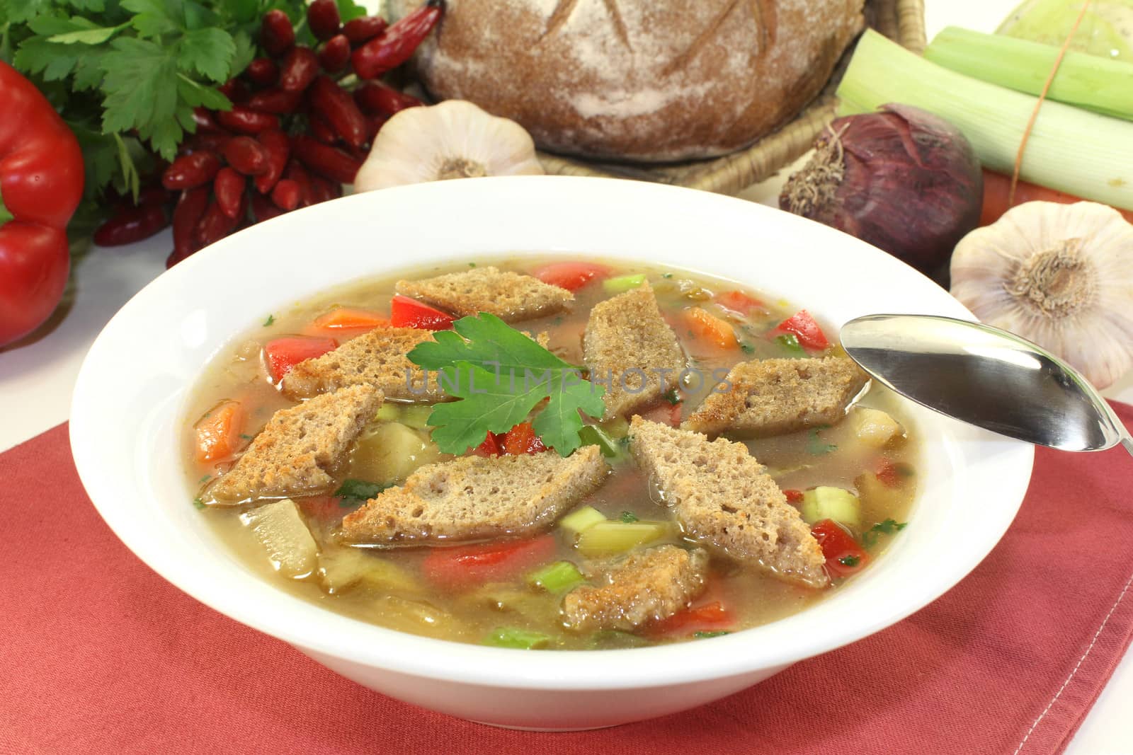 a plate with a colorful bread soup