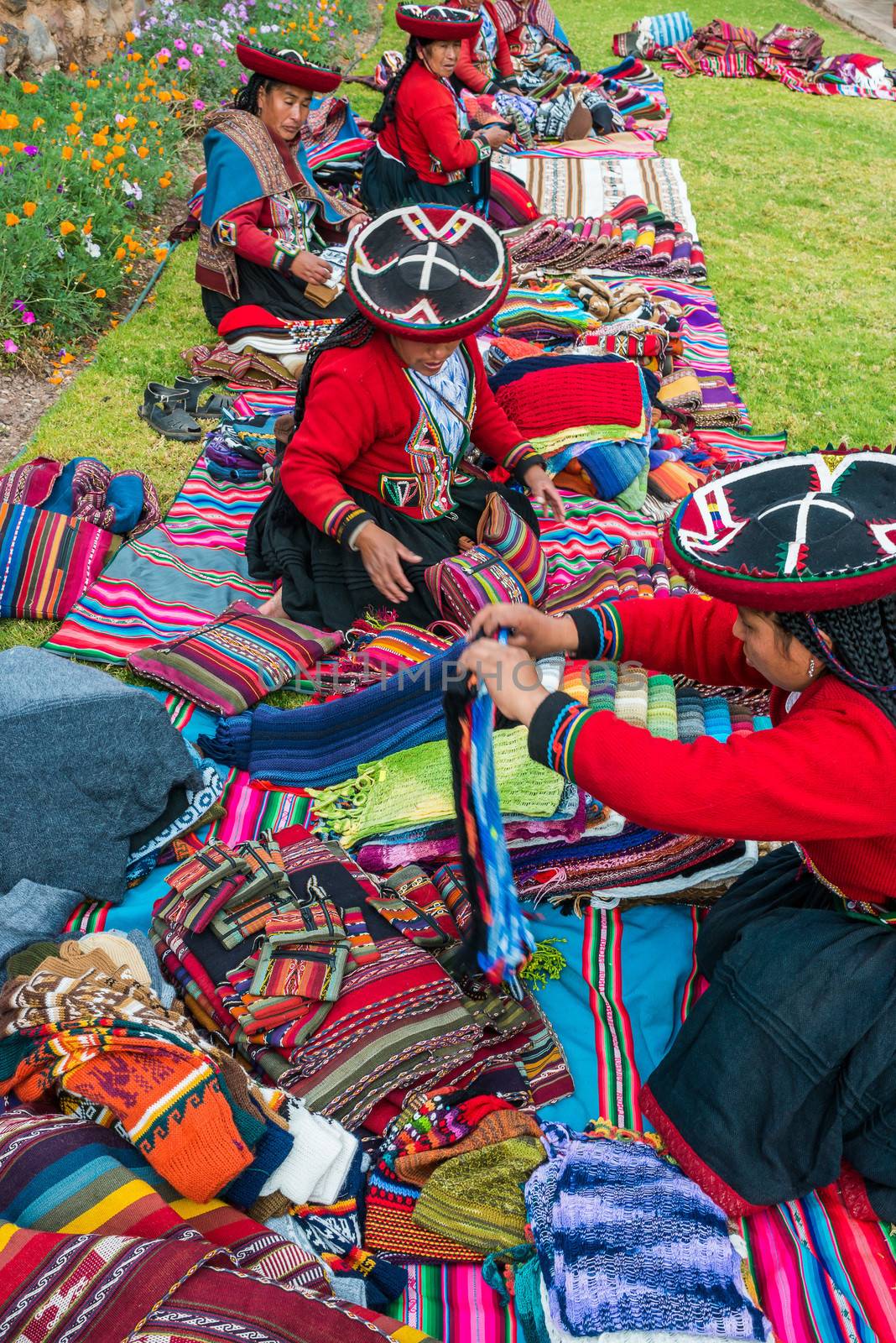 Cuzco, Peru - July 15, 2013: women selling handcraft in the peruvian Andes at Cuzco Peru on july 15th, 2013
