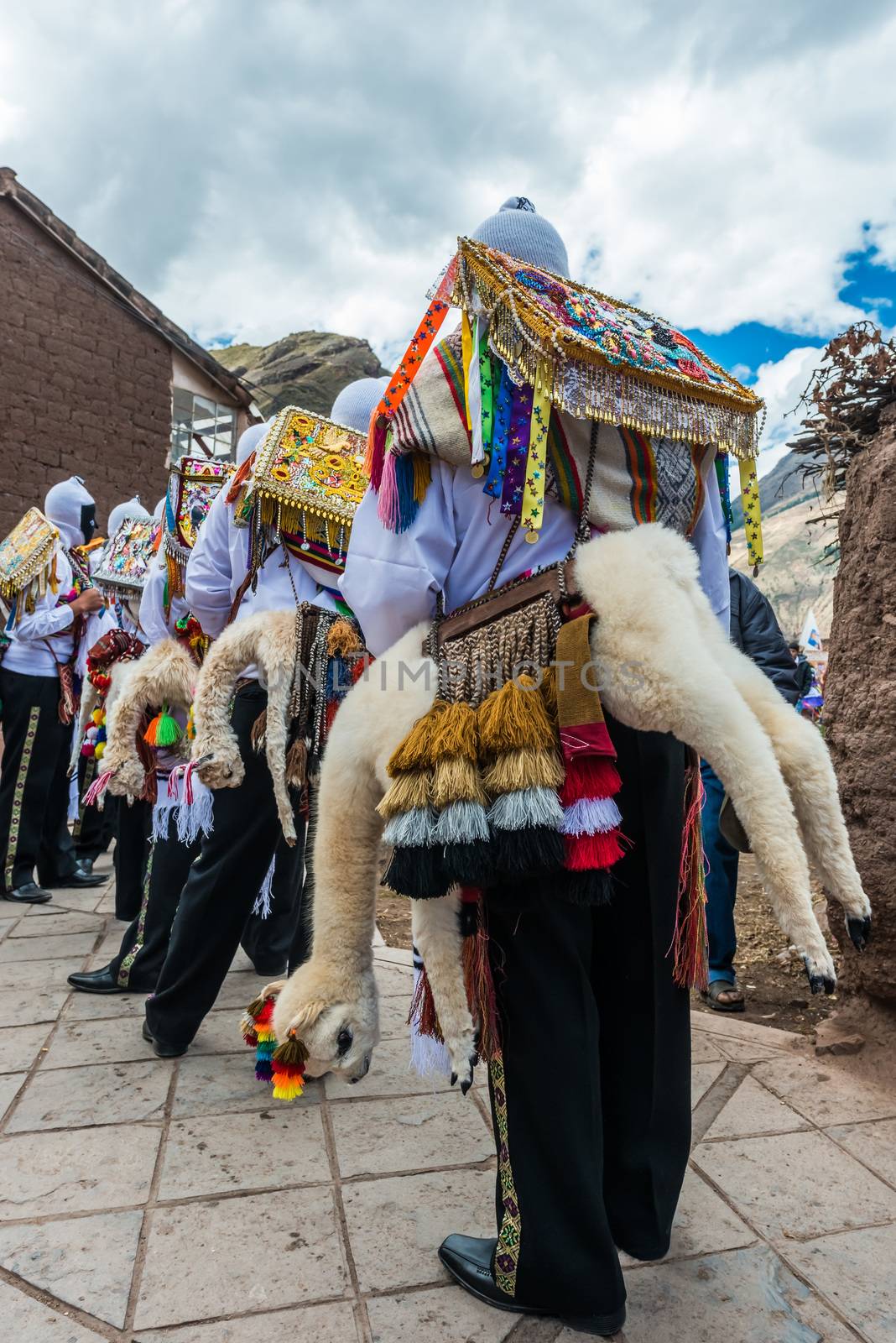 Pisac, Peru - July 16, 2013: dancers at Virgen del Carmen parade in the peruvian Andes at Pisac Peru on july 16th, 2013