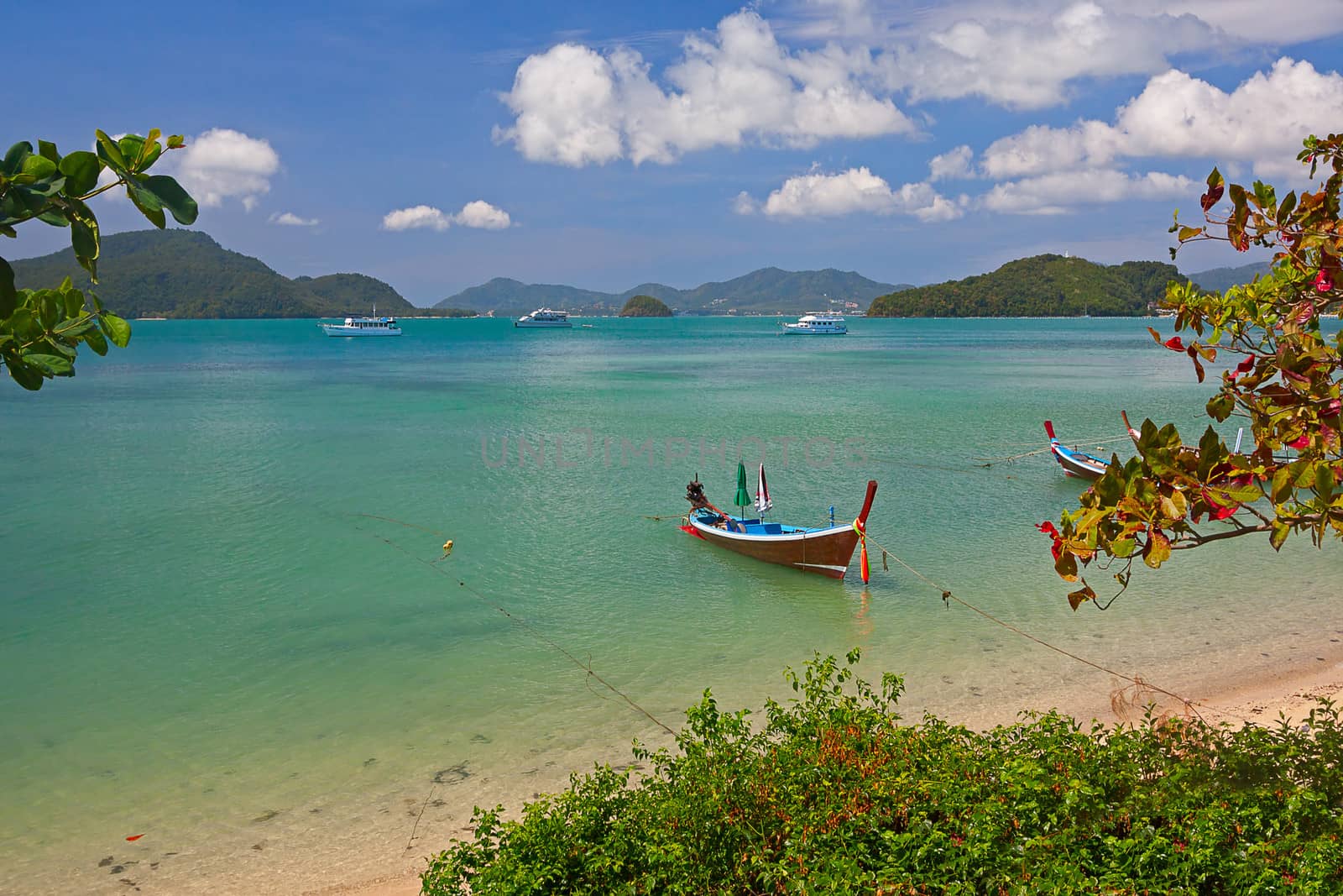 Boat in  sea is moving over  waves, Thailand. Beautiful tropical landscape.