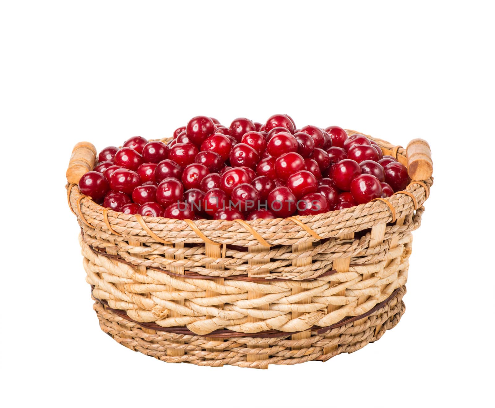 sweet cherry in basket isolated on white background by Draw05