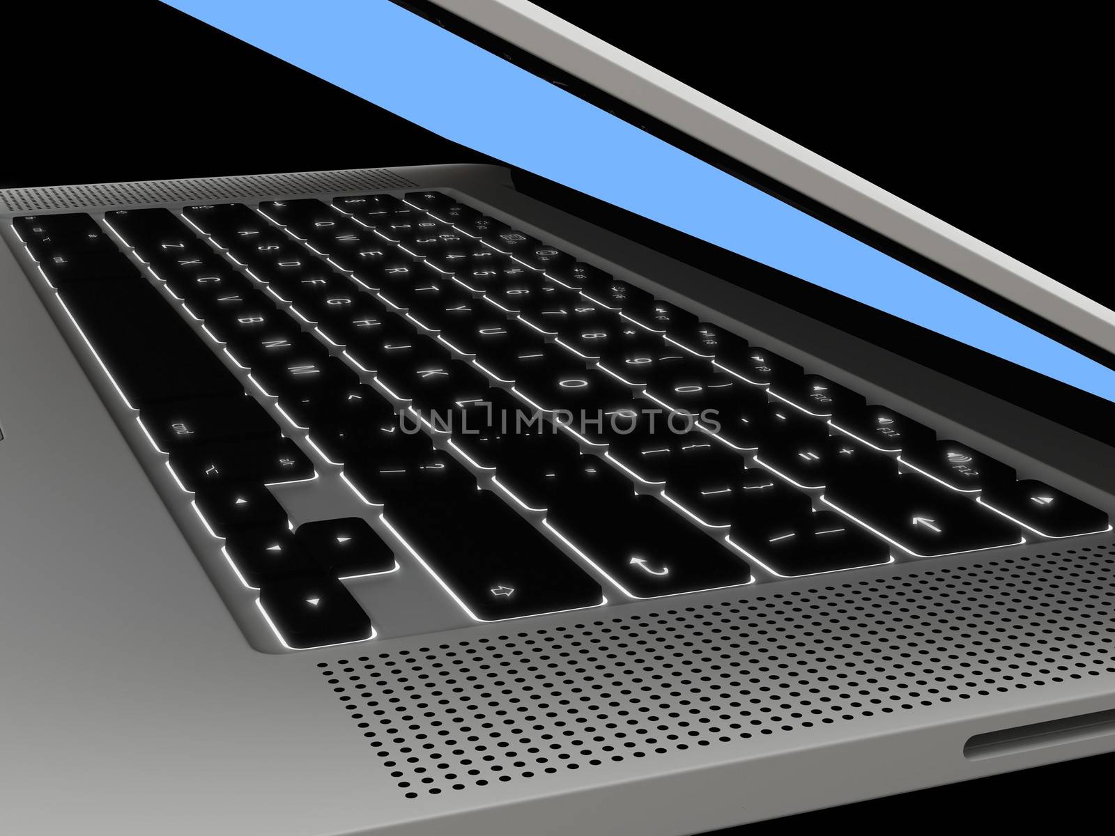 Detail of illuminated keyboard on modern laptop computer