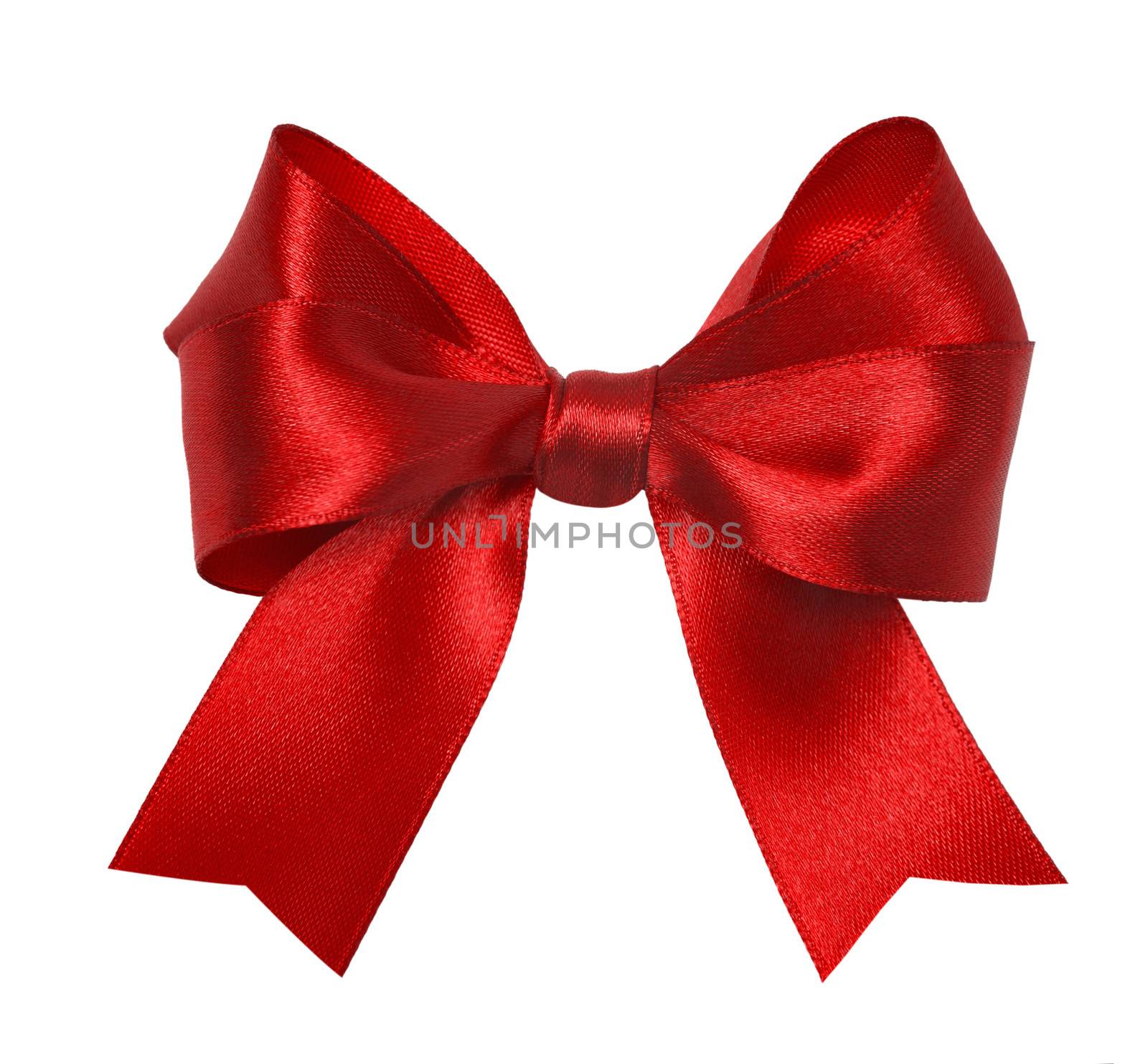 Shiny red satin ribbon on white background