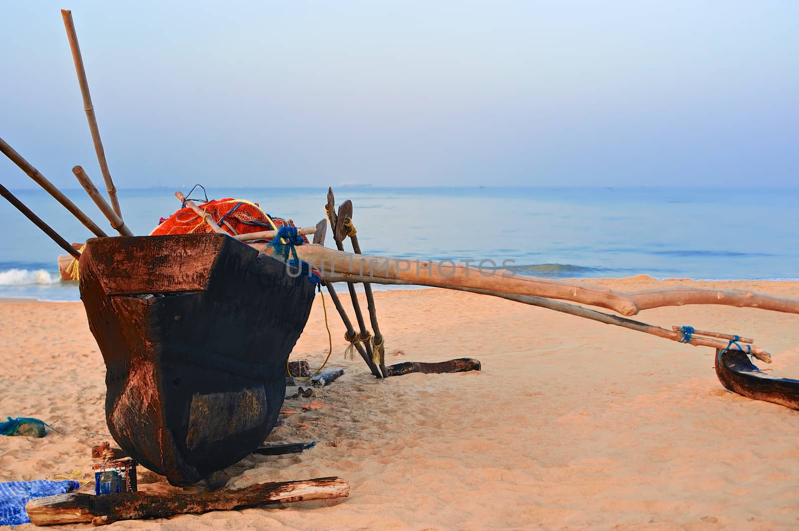 Old fishing boat on the beach of Goa, India