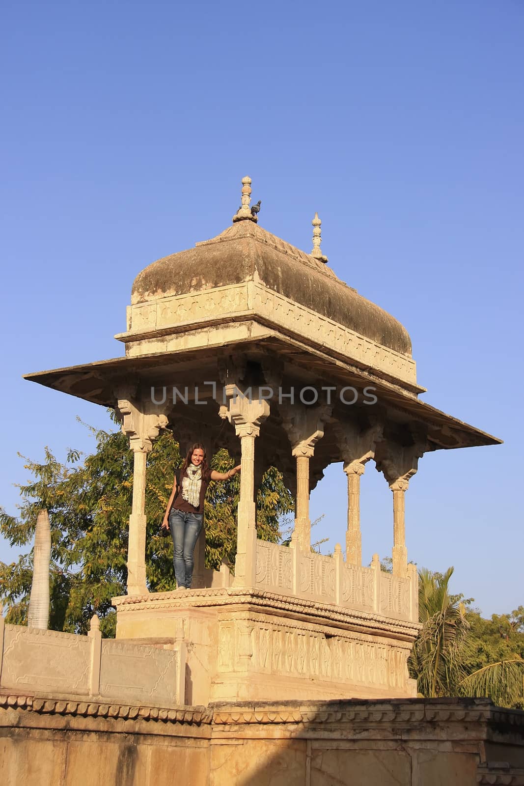 Young woman standing at Raniji ki Baori, Bundi, Rajasthan by donya_nedomam