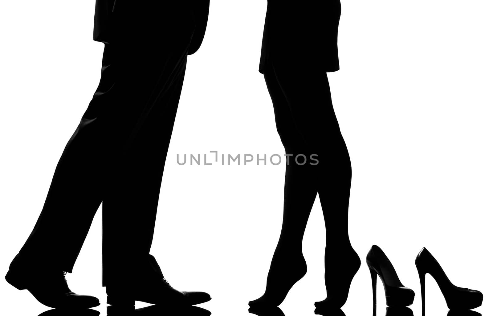 one caucasian detail legs feet couple man and woman tiptoe lovers teenderness in studio silhouette isolated on white background