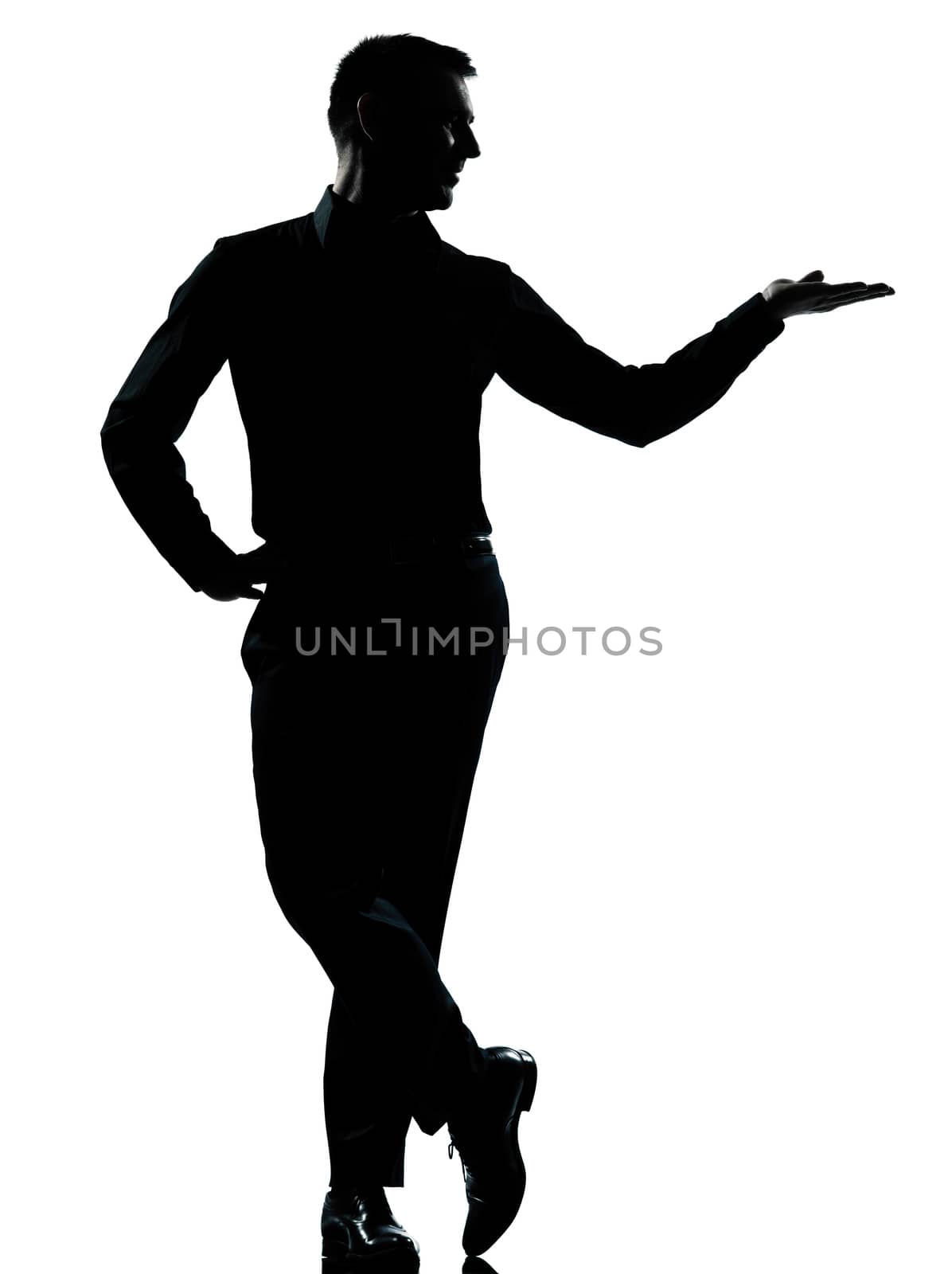 one caucasian business man silhouette standing hand open  Full length in studio isolated on white background