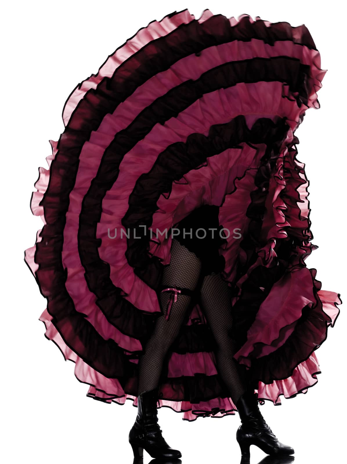 woman dancer dancing french cancan in studio isolated on white background