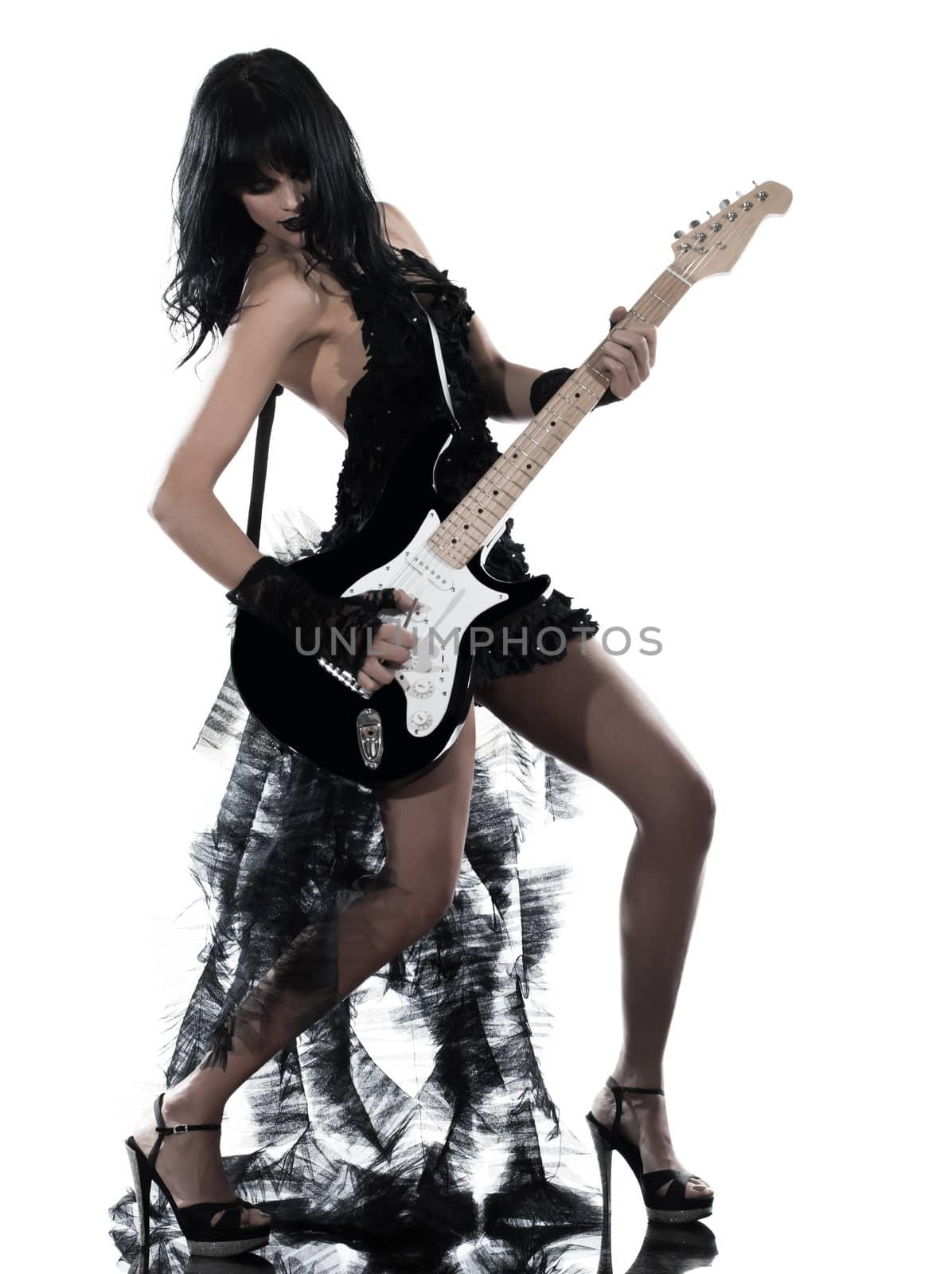 one woman playing electric guitar on studio isolated white background