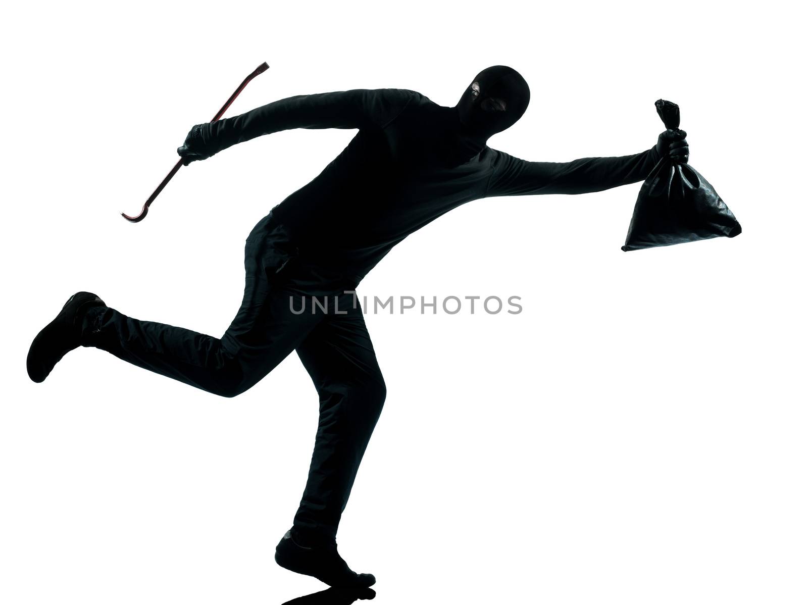 thief criminal running in silhouette studio isolated on white background in silhouette studio isolated on white background