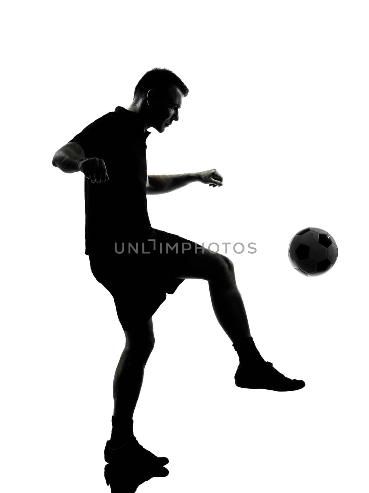 one man soccer player in studio silhouette isolated on white background