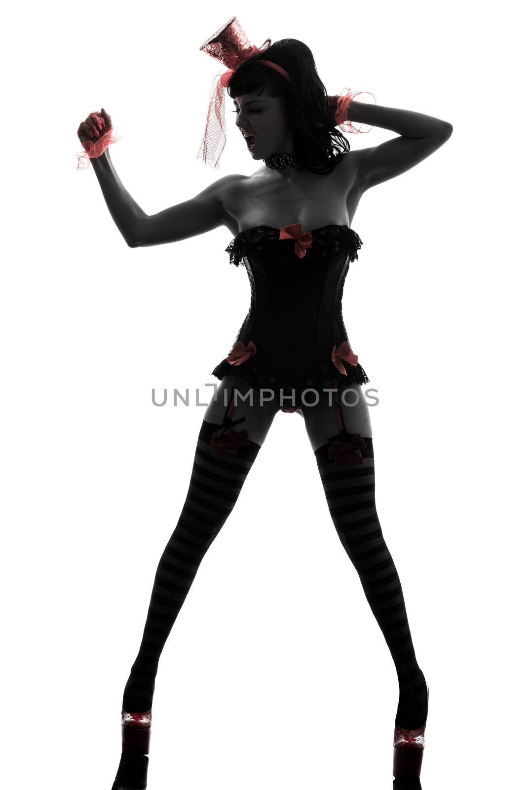 one sexy  caucasian woman stripper showgirl   in silhouette studio isolated on white background