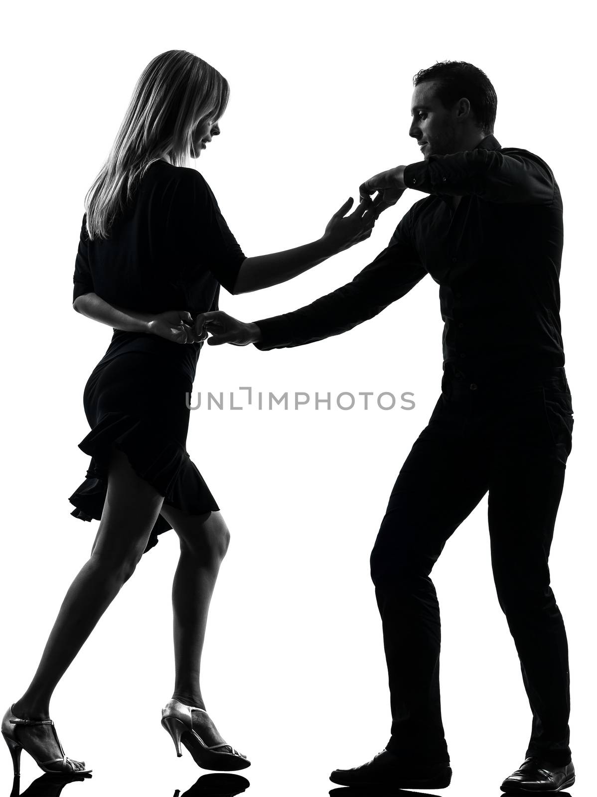 one caucasian couple woman man dancing dancers salsa rock  in silhouette studio isolated on white background