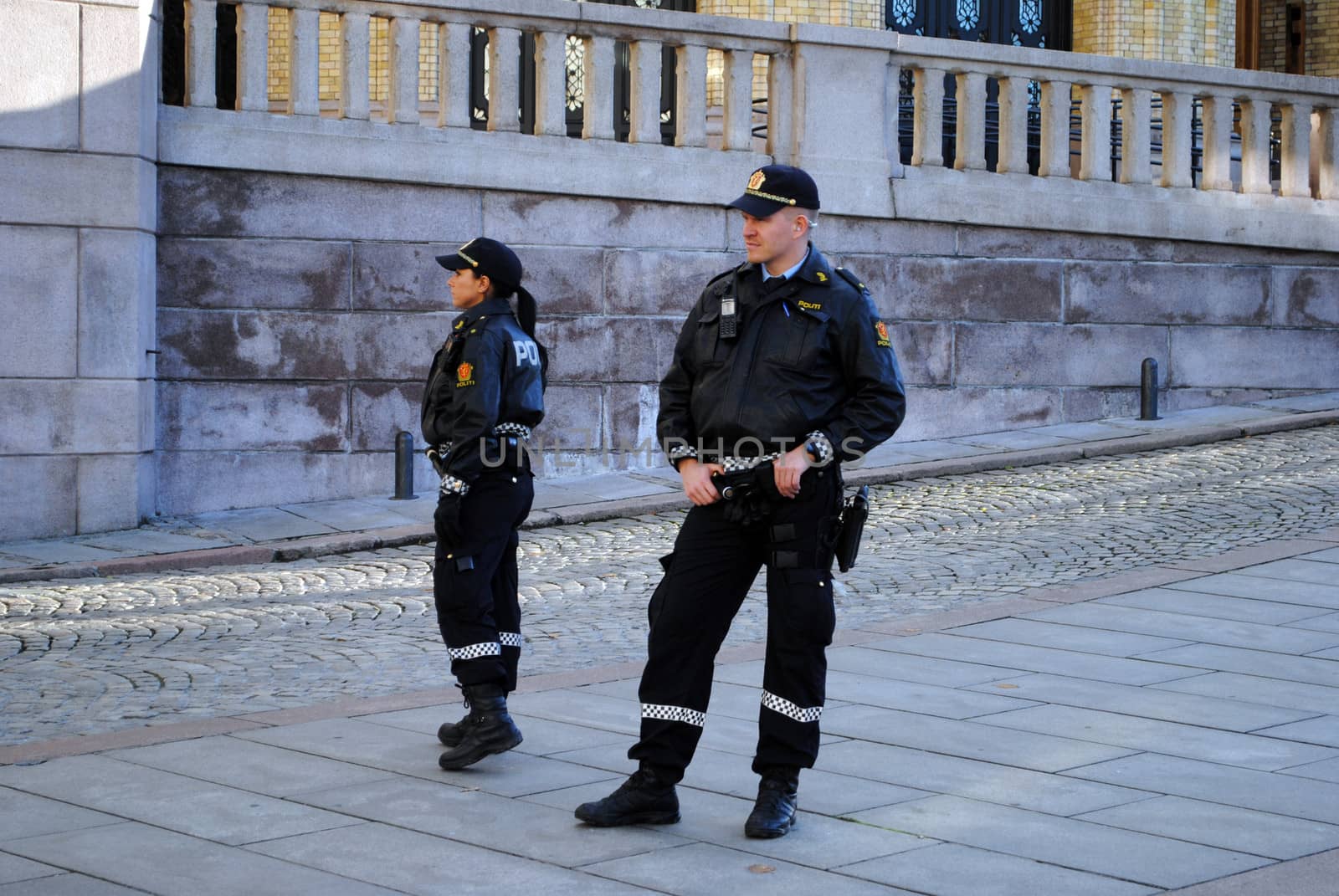 Norwegian police officers in front of the Norwegian parliament (Stortinget).