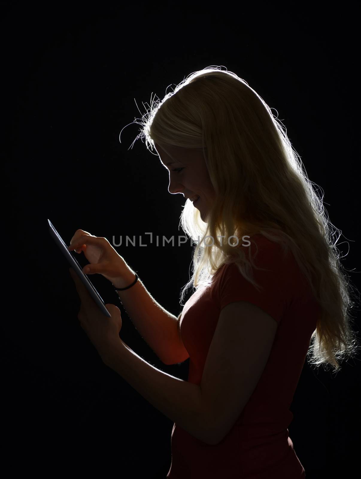 happy young woman with digital tablet