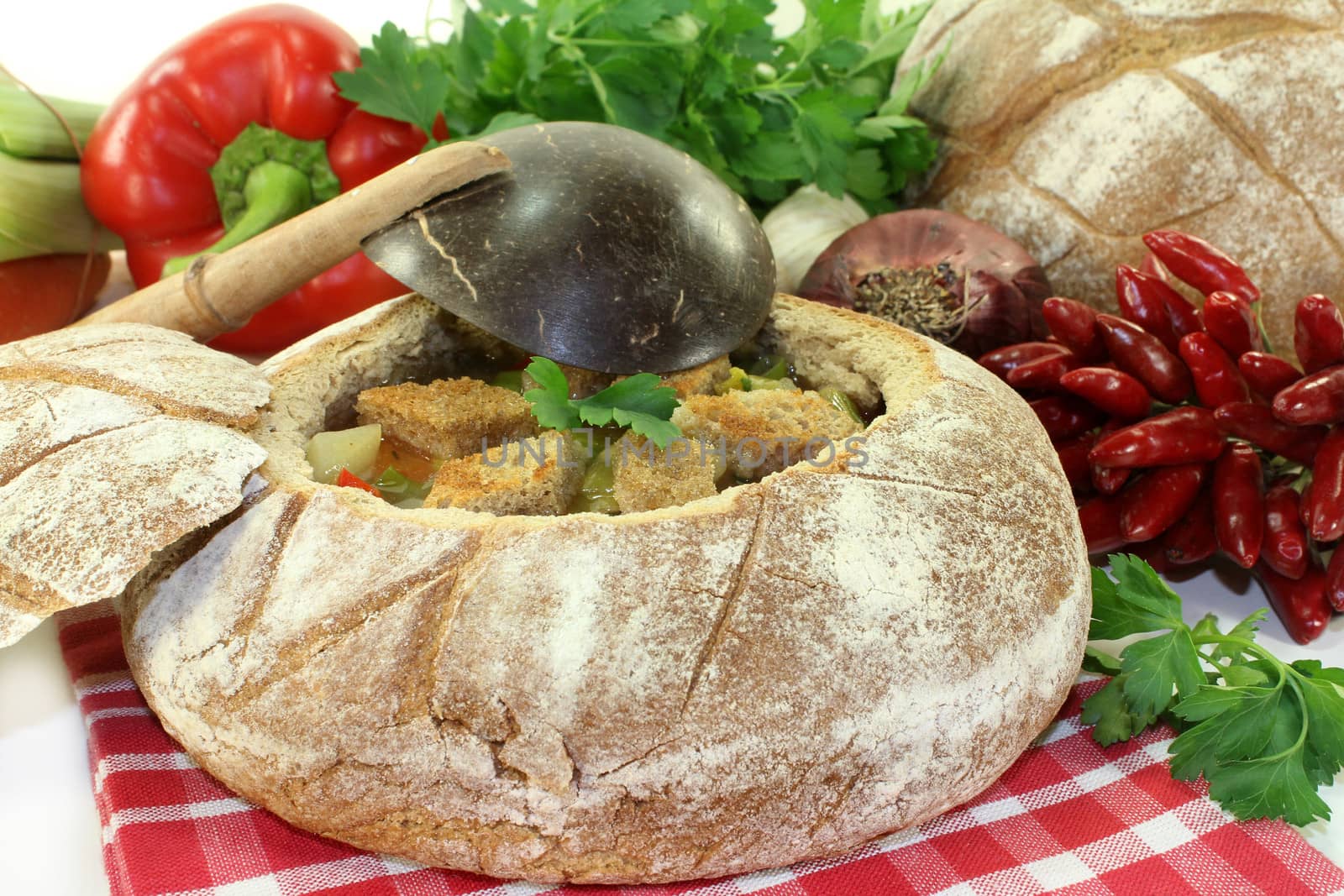 a farmhouse bread stuffed with a colorful bread soup