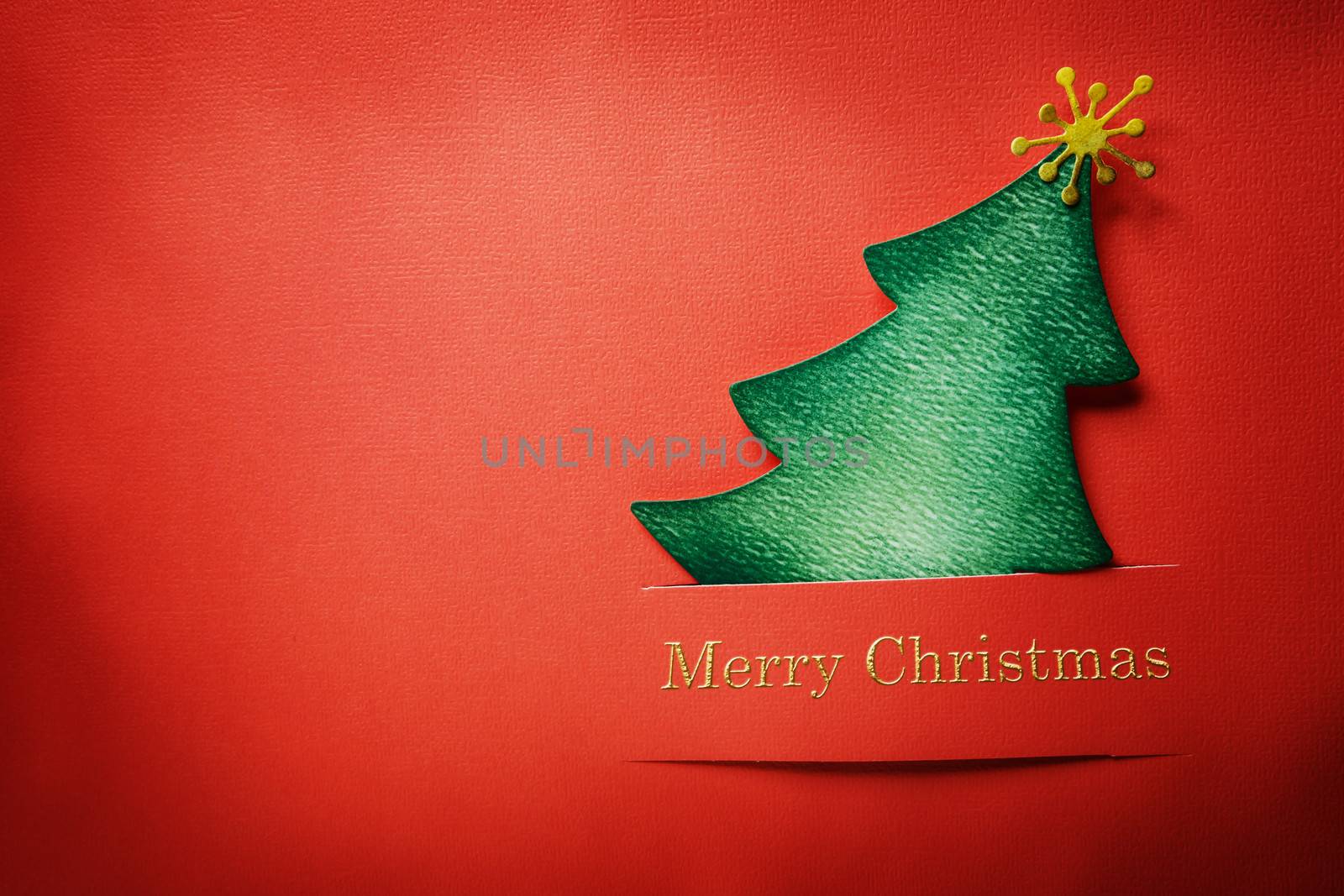 Handmade paper craft Christmas tree with Merry Christmas text