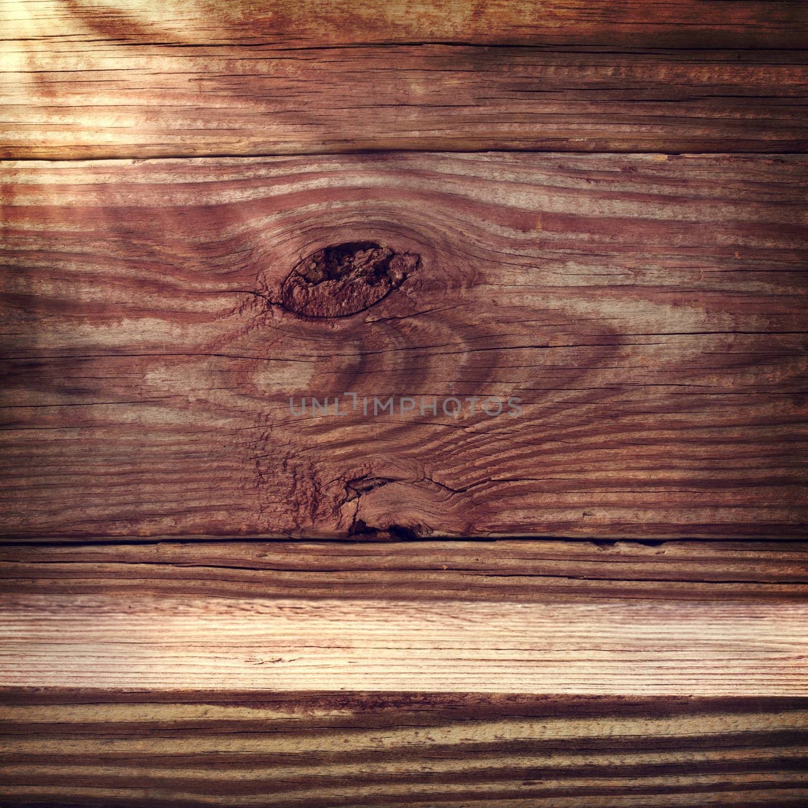 Aged rustic wooden boards with sun light