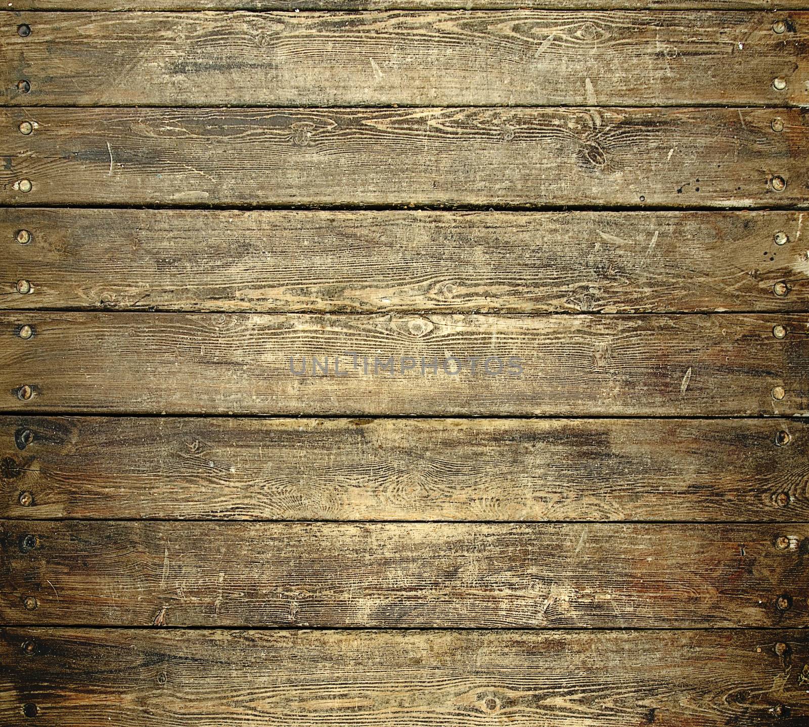 Background of old worn wooden planks with nails by pt-home