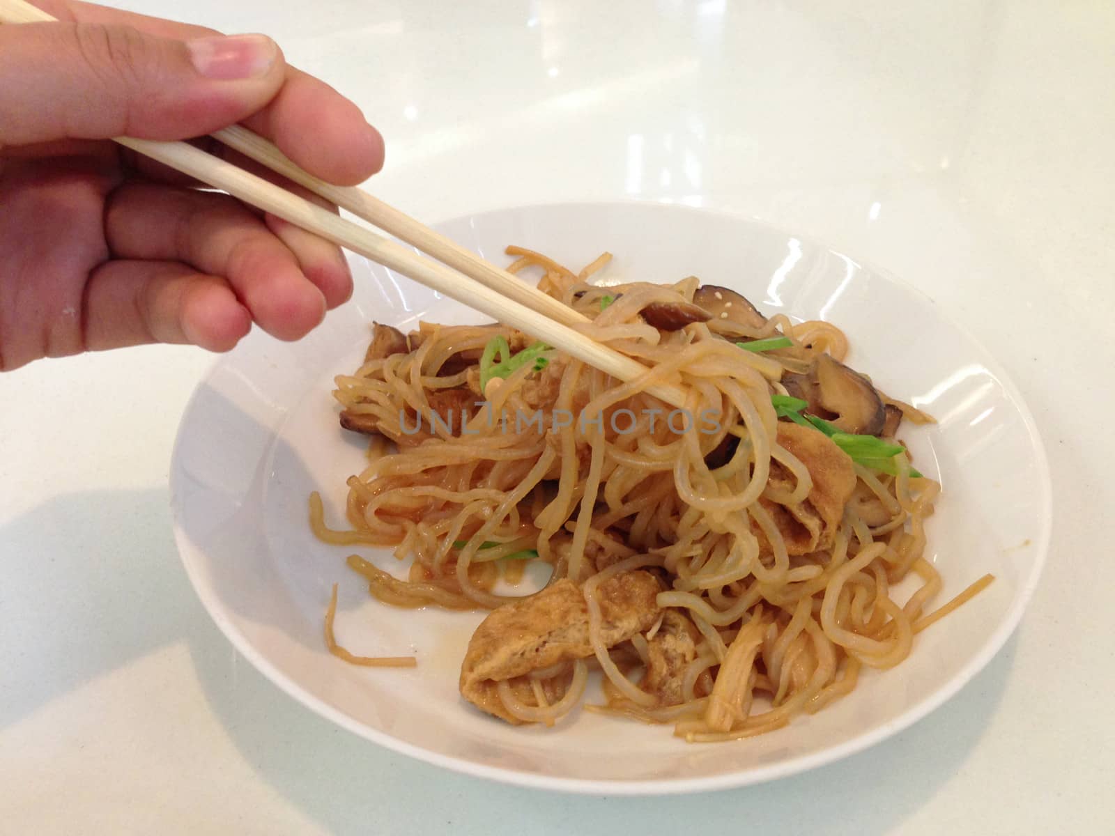 fried konjac noodles with mushroom and sauce