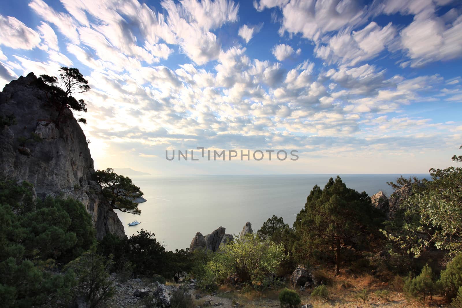 Cloudy sky over the mountains and the sea. Noviy Svet, Crimea, Ukraine

