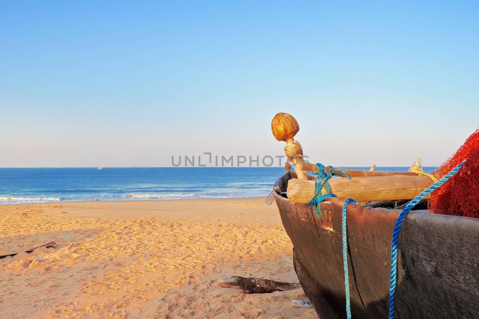 Old fishing boat on the beach of Goa, India